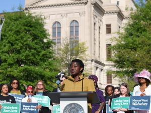 Tamara Taitt, the executive director of the Atlanta Birth Center and a plaintiff in a lawsuit against Georgia’s midwifery restrictions, speaks at a news conference outside the state Capitol in Atlanta on April 2, 2026. (Photo by Maya Homan/Georgia Recorder)