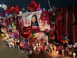 A memorial honoring San Carlos Apache teen Emily Pike can be seen at the intersection of Mesa Drive and McKellips Road in Mesa, Arizona, the location where she was last seen in January 2025. (Photo by Shondiin Silversmith/Arizona Mirror)