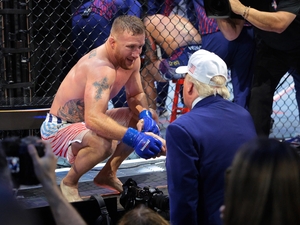 Justin Gaethje talks to President Donald Trump after defeating Ilia Topuria in a lightweight title bout during UFC Freedom 250 on the South Lawn of the White House on June 15, 2026 in Washington, D.C. (Photo by Chip Somodevilla/Getty Images)