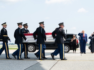 Soldiers at Dover Air Force Base in Delaware carry Army 1st Lt. Tyler James Feehan, who died July 18, 2026, from injuries suffered during an enemy attack on July 17, 2026, at Muwaffaq Salti Air Base, Jordan, on July 22, 2026. (Photo by Jason Minto/U.S. Air Force)