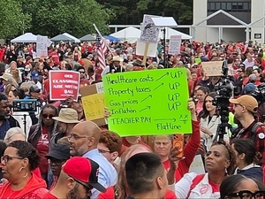 Thousands of North Carolina teachers rallied on May 1 outside the Legislature to say their pay has not kept up with rising inflation or healthcare costs. (Photo by Clayton Henkel/NC Newsline)