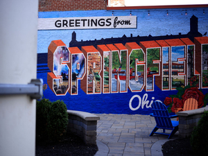 A mural is displayed in an alley downtown in Springfield, Ohio. (Photo by Luke Sharrett/Getty Images)