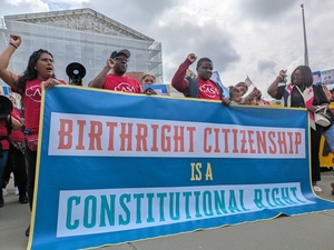 Demonstrators from the immigration advocacy organization CASA chant "Up, up with liberation, down, down with deportation" outside of the U.S. Supreme Court on May 15, 2025, as justices heard oral arguments on the Trump administration's legal challenge to birthright citizenship. (Photo by Ashley Murray/States Newsroom)