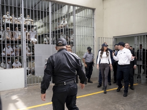 Kristi Noem, at the time secretary of the Department of Homeland Security, receives a tour of the CECOT prison with Minister of Justice and Public Security Gustavo Villatoro in Tecoluca, El Salvador, on March 26, 2025. (Photo by Tia Dufour/Department of Homeland Security)
