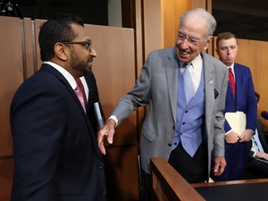 Federal Bureau of Investigation Director Kash Patel, left, greets Senate Judiciary Chairman Chuck Grassley as Patel arrives to testify during a Senate Judiciary Committee hearing in the Hart Senate Office Building on Sept. 15, 2026 in Washington, D.C. (Photo by Win McNamee/Getty Images)