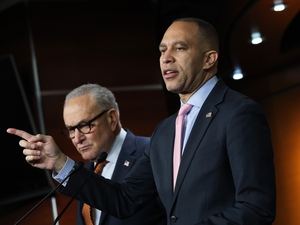 House Minority Leader Hakeem Jeffries, D-N.Y., speaks as Senate Minority Leader Chuck Schumer, D-N.Y., looks on during a news conference at the U.S. Capitol on Jan. 8, 2026 in Washington, D.C. (Photo by Kevin Dietsch/Getty Images)