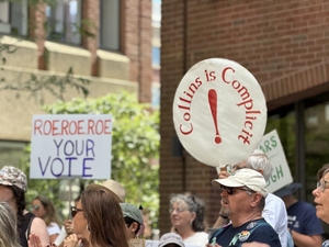 Protesters target Collins’ support of Kavanaugh on Dobbs anniversary