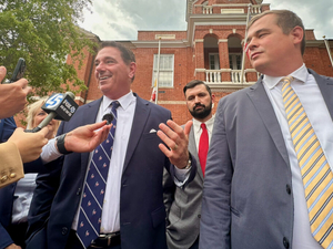 Judge expresses concerns, delays ruling in challenge to redistricting amendment