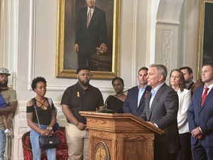 Stein signs criminal justice, state employment bills; expects budget action Tuesday