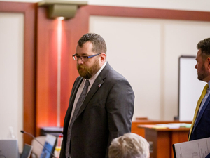 Security volunteer ordered to stand trial in accidental shooting of Utah No Kings protester 