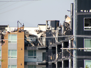 As forests burn across the state, a cluster of residential fires also takes a toll