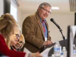Republican Party of Wyoming Chair Bryan Miller talks from the podium during the Wyoming Republican State Convention on Saturday, April 25, 2026, in Douglas. (Dan Cepeda/WyoFile)