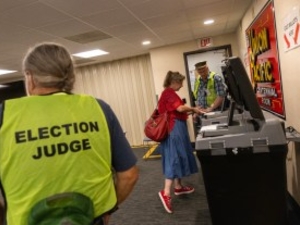 DOJ election monitors will return to Cheyenne, but this time they’ve agreed to stay 100 yards from polling places