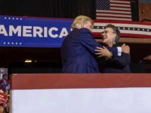 Donald Trump embraces Wyoming's then congressional candidate Harriet Hageman at a "Save America" rally in Casper, Wyoming, May 28, 2022. Hageman, who was endorsed by Trump ran against Liz Cheney. (Natalie Behring)