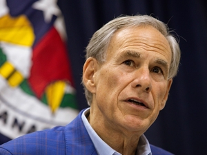 After week of silence, Gov. Greg Abbott calls fatal ICE shooting “tragic”