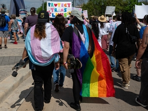 Group behind trans mailers must answer questions under oath, Travis County judge rules