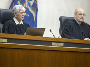 Lawsuit contends North Dakota utilities, regulators mishandled powerline case
