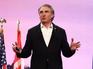 Burgum touts AI data centers, calls Iran war ‘gift to the world’ in speech to oil industry