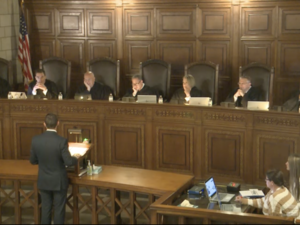 Justices consider appeal in challenge to Nebraska overseas voter law