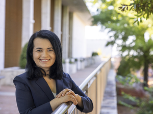 Once banned from education, she hid her books in a Quran. Now she holds a doctorate degree.