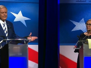 Debate between the 2 US Senate candidates highlights their differing backgrounds