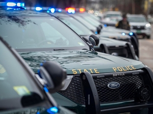 In latest attempt to charge March 11 ICE protesters, state police identify man accused of smashing police van window