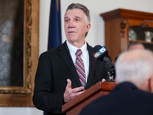 Phil Scott issues executive order that would allow age-based health insurance premiums
