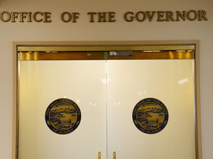 What previously undisclosed financial dealings are in Alaska’s governor candidate records?
