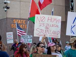 Eyeing upcoming elections, Arizona activists want their city officials to stand up to ICE