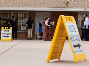 Judge blocks Arizona elections rule barring ‘intimidating’ and ‘harassing’ clothing