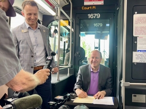 ​RTD board overhaul signed by Gov. Polis on a Denver bus