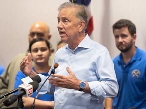 Lamont pledges eviction reform as tenants, lawmakers condemn corporate landlord