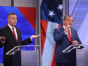 Cowbells and handshakes open Magaziner-Mellor debate, but little agreement follows
