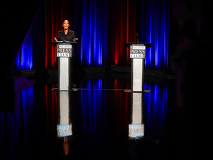 Bottoms faces empty podium on debate stage while Jackson campaigns with Kemp