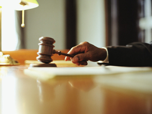 Fired police officer sues city over claims surrounding his private security work