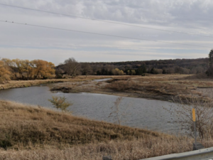 Manure discharge from feed lot in Cherokee County reaches tributary of Mill Creek 