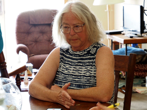 Three years after police raid on Kansas newspaper, reporter settles lawsuit for $850K