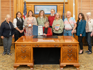 As Pride Month dawns, Kansas governor helps celebrate rainbow flag creator Gilbert Baker