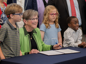 Kansas governor achieves goal to open early childhood office, months before her term ends