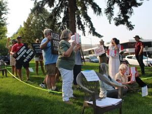 Advocates gather at vigil for ICE shooting victims in Helena