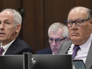Utility executives reindicted on state bribery charges