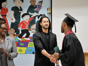Harvard scientist visits prison where he was once incarcerated, gives graduation speech