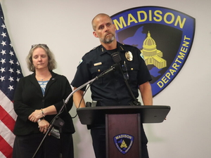 Madison police shooting briefing devolves into shouting match; hundreds of mourners gather for vigil