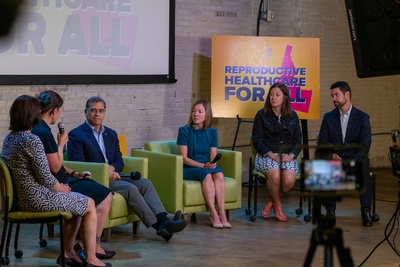U.S. Health and Human Services Secretary Xavier Becerra, left, listens to an Idaho woman tell her story of needing an abortion because of severe fetal abnormalities and being unable to get care in Idaho. Becerra was in Idaho on Wednesday for a planned event about reproductive rights. (Kyle Pfannenstiel/Idaho Capital Sun)