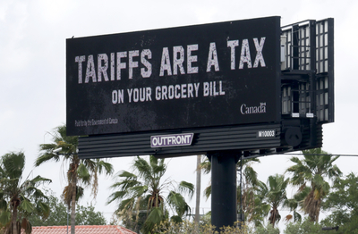 A billboard displays a message reading 'tariffs are a tax on your grocery bill' on March 28, 2025 in Miramar, Florida. The Canadian government has placed the anti-tariff billboards in numerous American cities in what they have described as an “educational campaign” to inform Americans of the economic impacts of tariffs. (Photo by Joe Raedle/Getty Images)