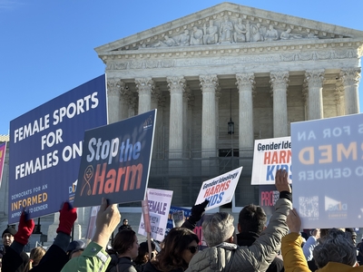 Demonstrators who back state bans on trans athletes rally outside the U.S. Supreme Court on Jan. 13, 2026, as the justices heard arguments on two cases. (Photo by Jane Norman/States Newsroom)