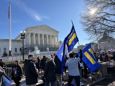 Demonstrators who back state bans on trans athletes rally outside the U.S. Supreme Court on Jan. 13, 2026, as the justices heard arguments on two cases. (Photo by Jane Norman/States Newsroom)