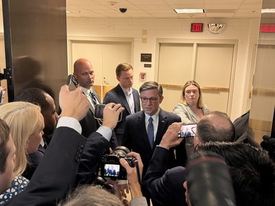 U.S. House Speaker Mike Johnson, R-La., talks with reporters inside the Capitol building in Washington, D.C., on Tuesday, Oct. 21, 2025. (Photo by Jennifer Shutt/States Newsroom)