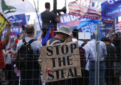 Supporters of President Donald Trump demonstrate at a ‘Stop the Steal’ rally in front of the Maricopa County Elections Department office on November 7, 2020 in Phoenix, Arizona. The demonstration began at the State Capitol earlier in the day. News outlets project that Joe Biden will be the 46th president of the United States after a victory in Pennsylvania with Kamala Harris to be the first woman and person of color to be elected Vice President. (Photo by Mario Tama/Getty Images)