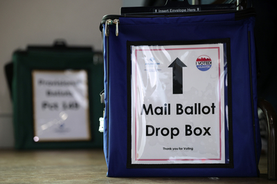 A mail ballot drop box is seen at a polling station on November 4, 2025 in Arlington, Virginia. (Photo by Alex Wong/Getty Images)